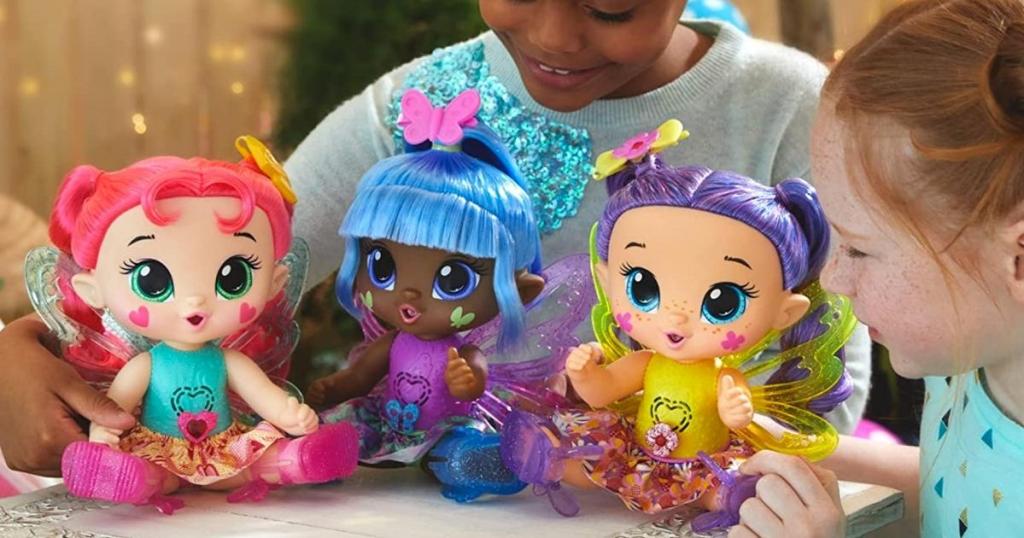 girls playing with baby alive glopixies dolls