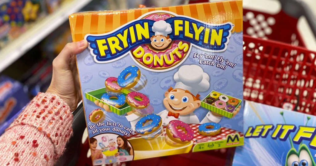 hand holding box for Fryin' Flyin Donuts Game