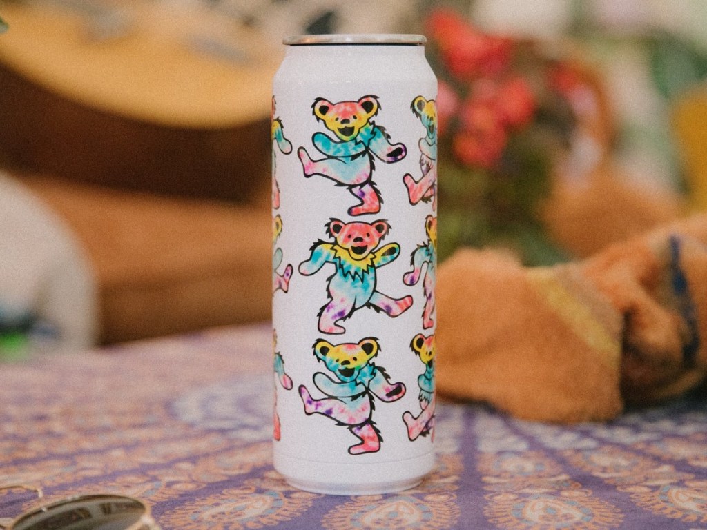 white tumbler with dancing bears