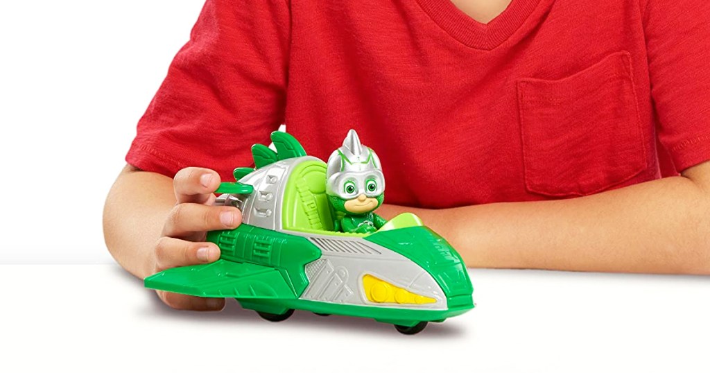 boy playing with PJ Masks Save The Sky Gekko Mobile