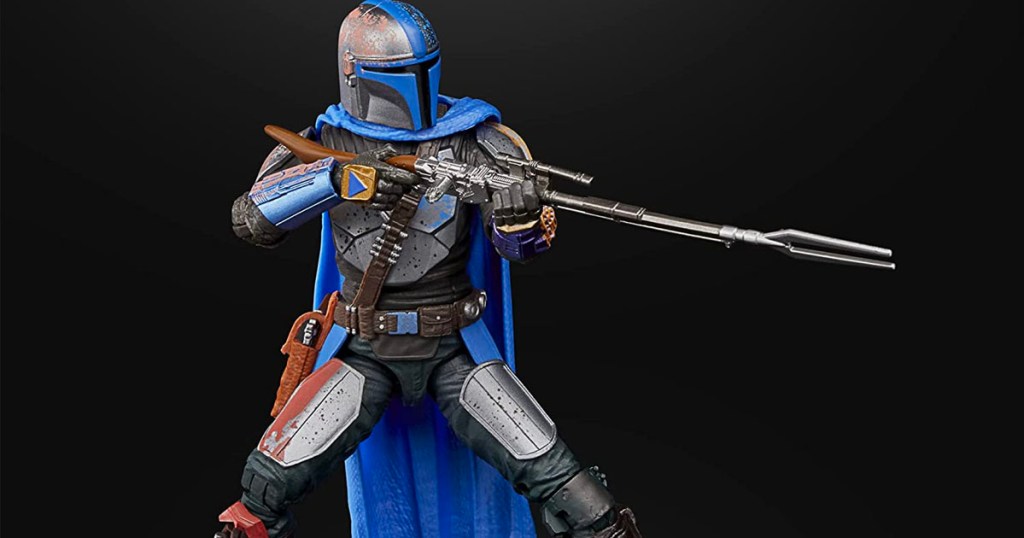 star wars mandalorian figure holding weapon