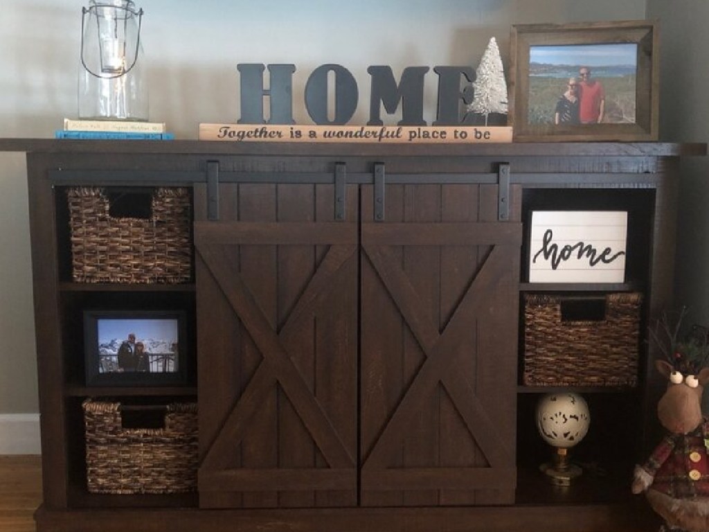 brown colored tv stand in a farmhouse style