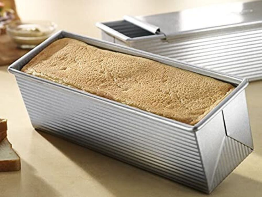 Two USA Pan Pullman pans with bread inside one