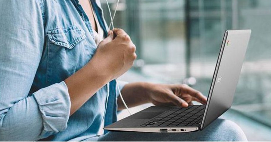 Woman typing on laptop
