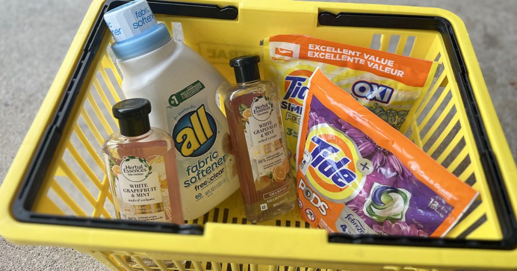 herbal essences, all and tide pods detergent inside dollar general shopping basket