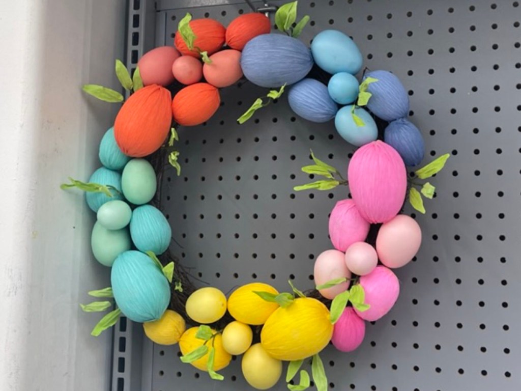 multi color easter egg wreath hanging in store