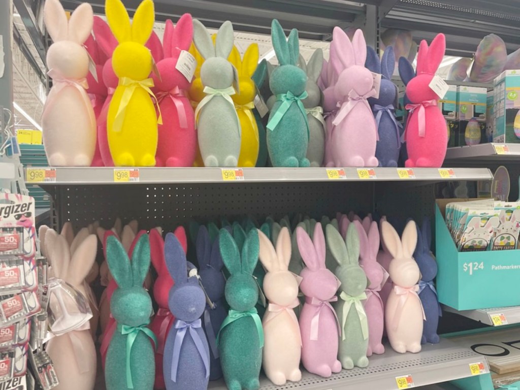 two rows of multi-colored focked bunnies on shelf