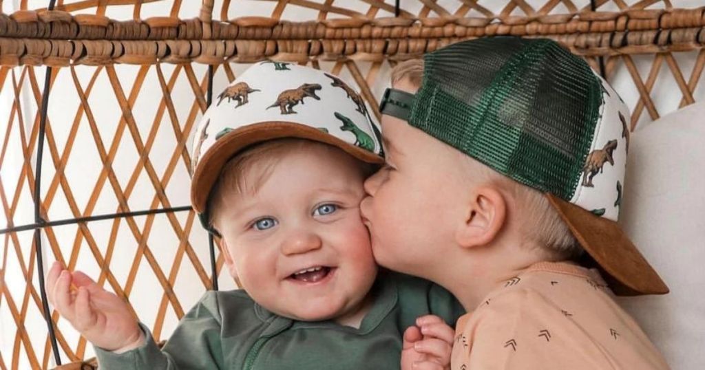 two little boys sitting together 