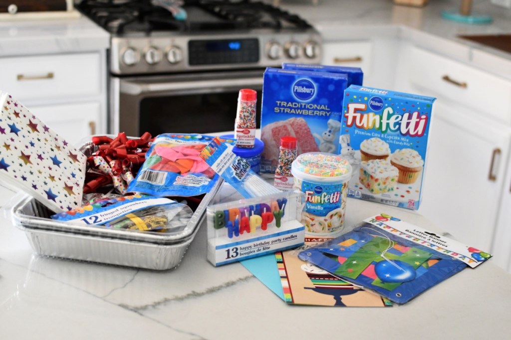 supplies on the counter for birthday in a box