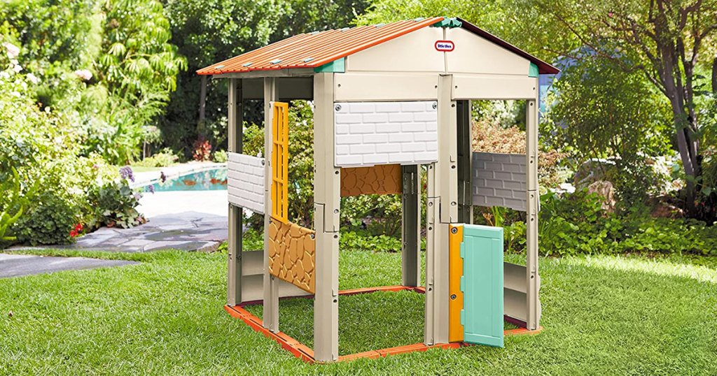 little tikes playhouse on grass