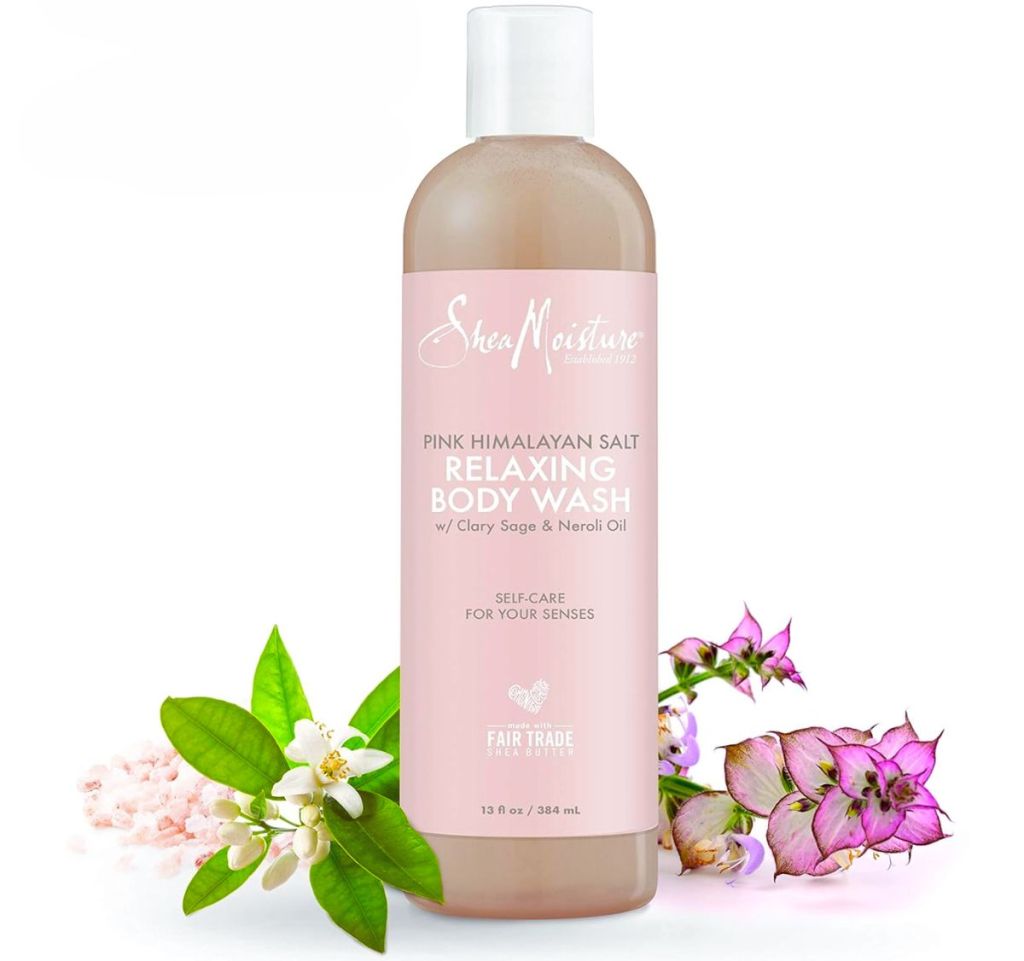 SheaMoisture Relaxing Body Wash w: Fair Trade Shea Butter 13oz pictured with flowers