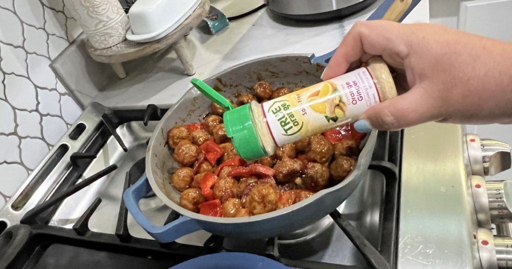 adding orange ginger to sweet bbq meatballs