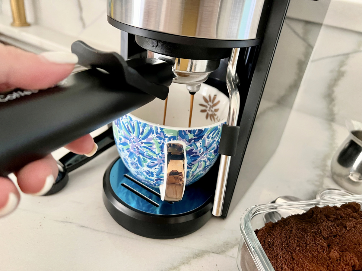 brewing espresso with a machine
