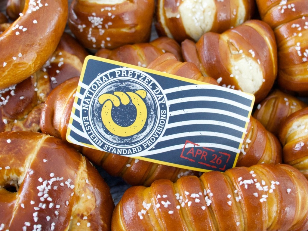 pretzel day coupon on pile of soft pretzels