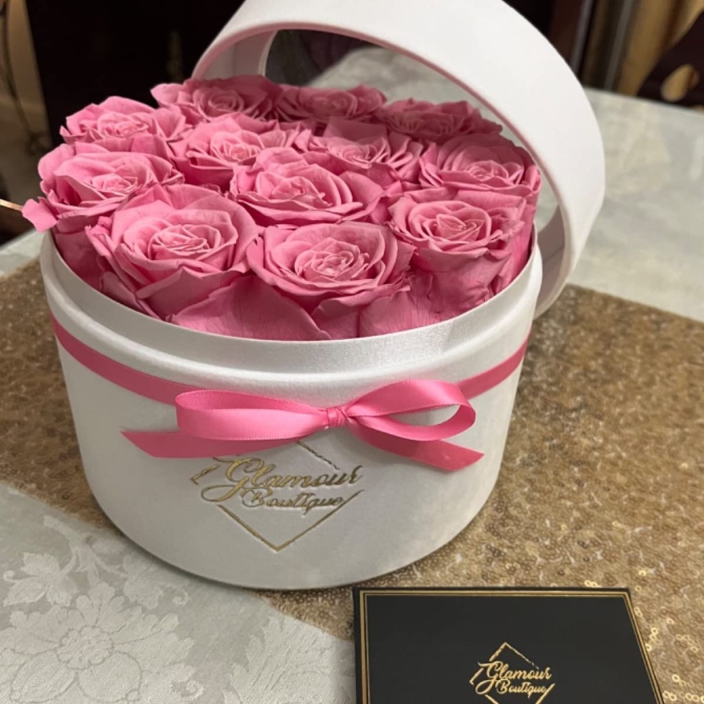 pink roses in a white box
