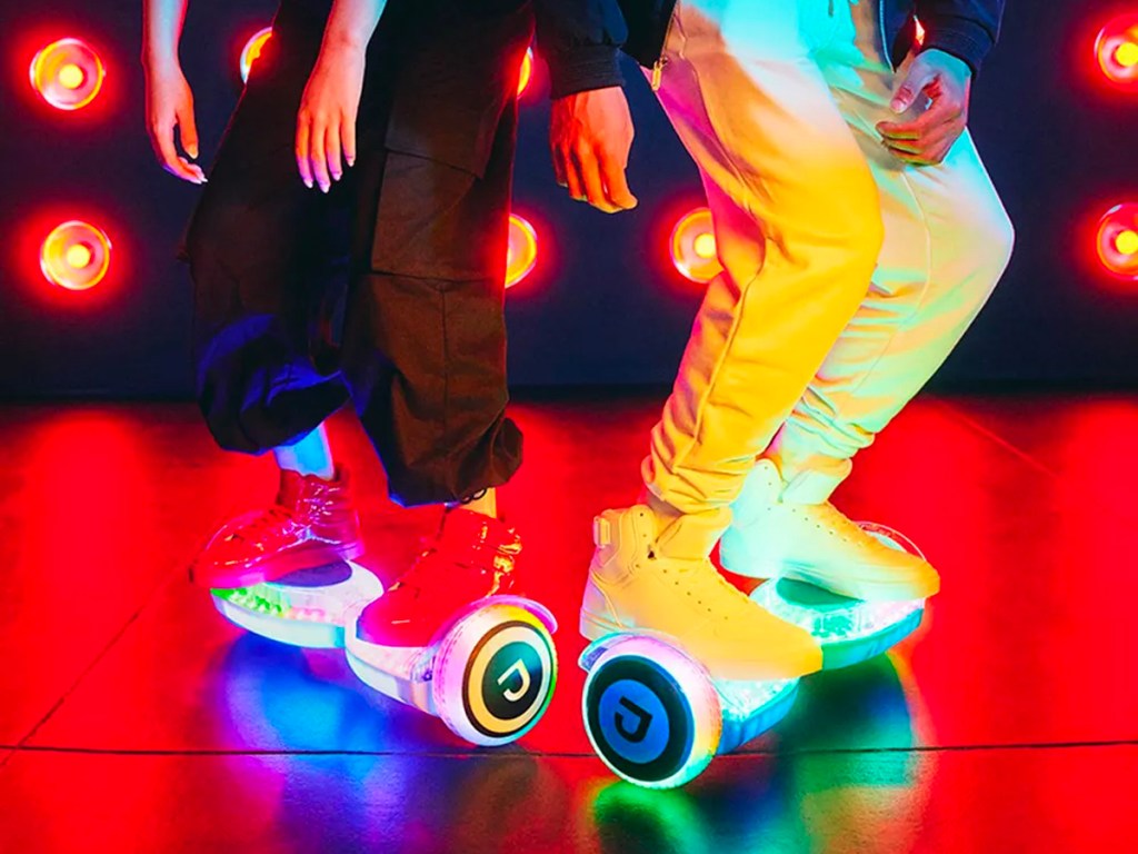 two teens riding white jetson hoverboards