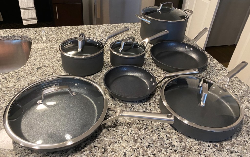 set of pots and pans in kitchen