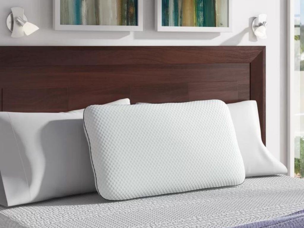Sleep Memory Foam Medium Support Pillows on bed