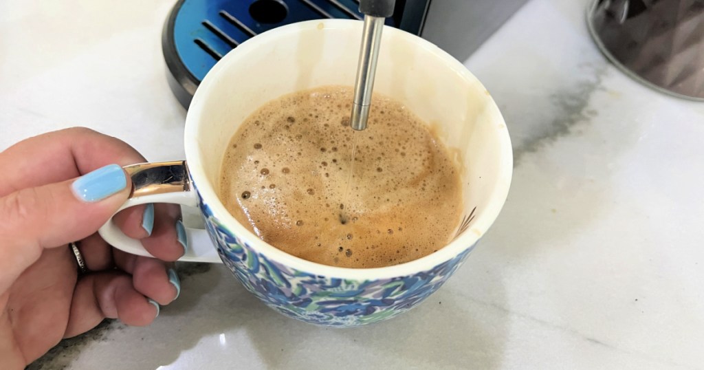 spout on espresso maker that adds water