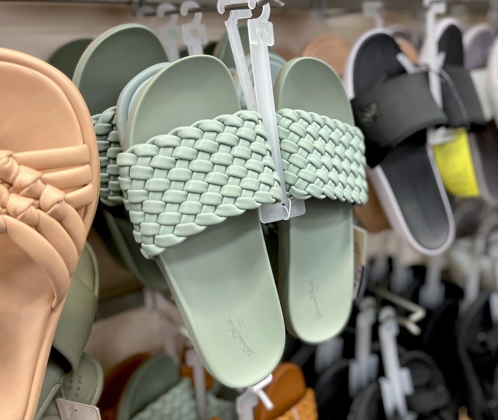 blue braided sandals hanging in store