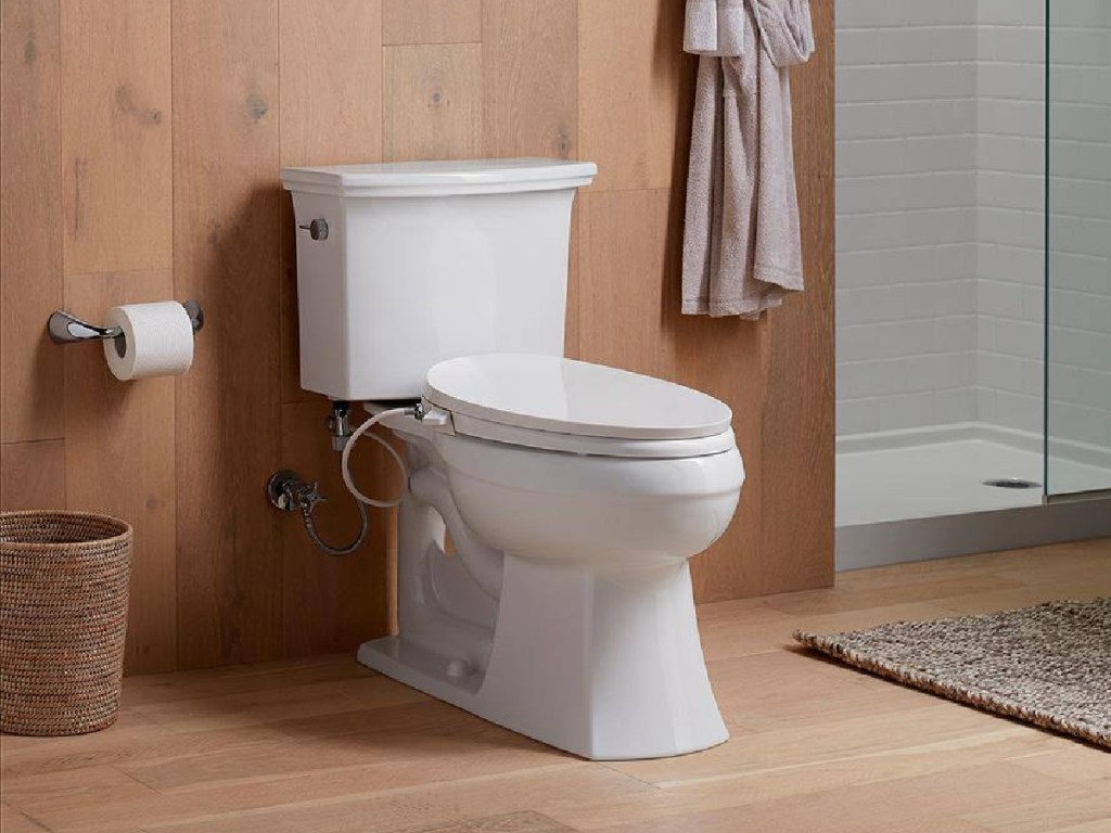 bidet seat on toilet in bathroom