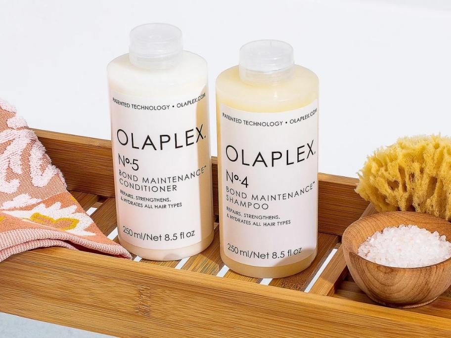 Olaplex Bond No.4 Shampoo & No.5 Conditioner Set on wood bath tray