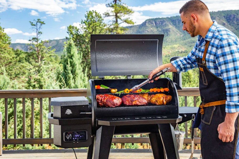 man grilling on pellet grill