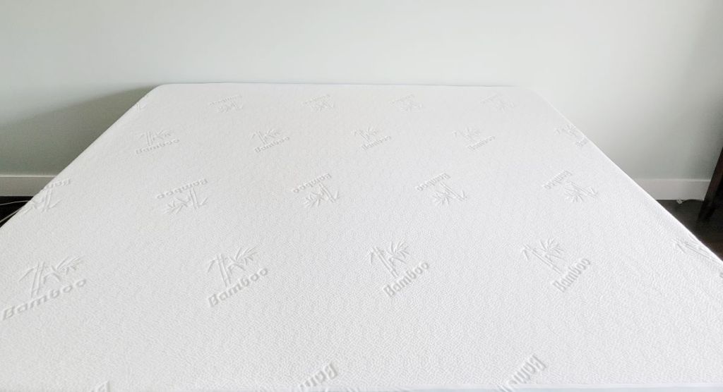 Swiss Comforts Bamboo Mattress Protector on a bed