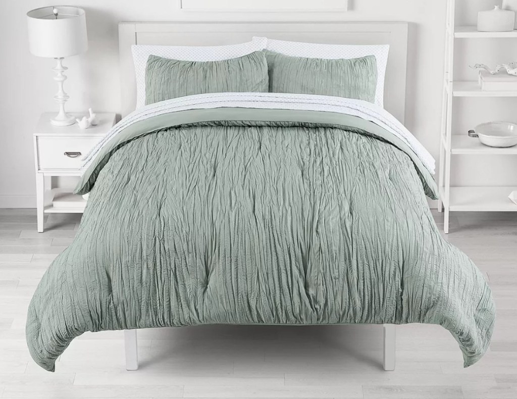bed with crinkle comforter on it