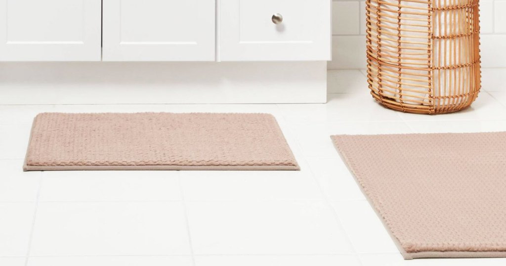 brown bath mats in bathroom