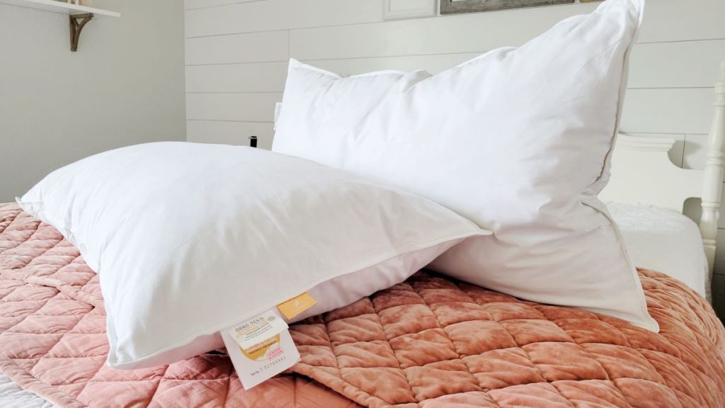 two pillows on a bed