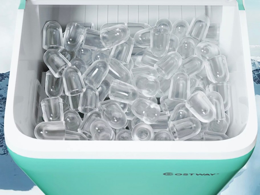 teal ice maker with ice inside