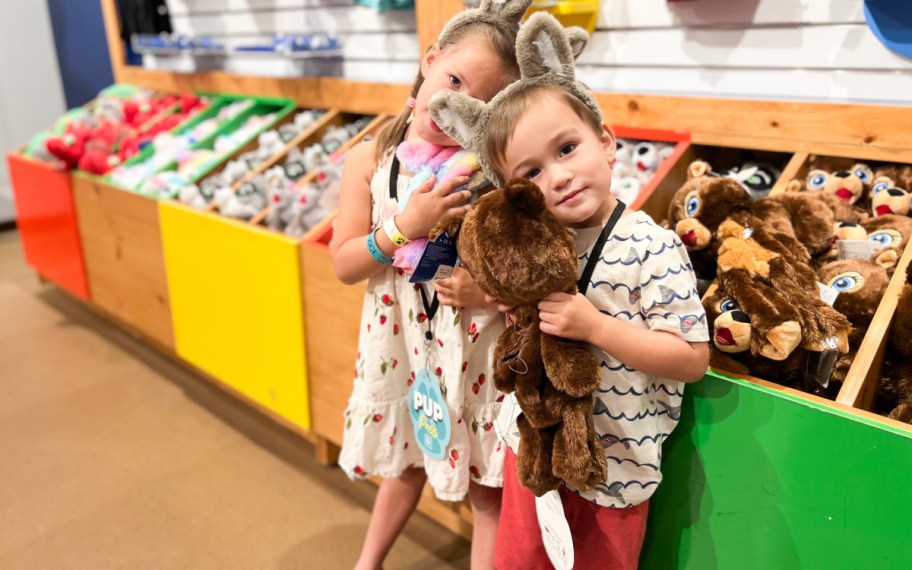 kids hugging build a bears