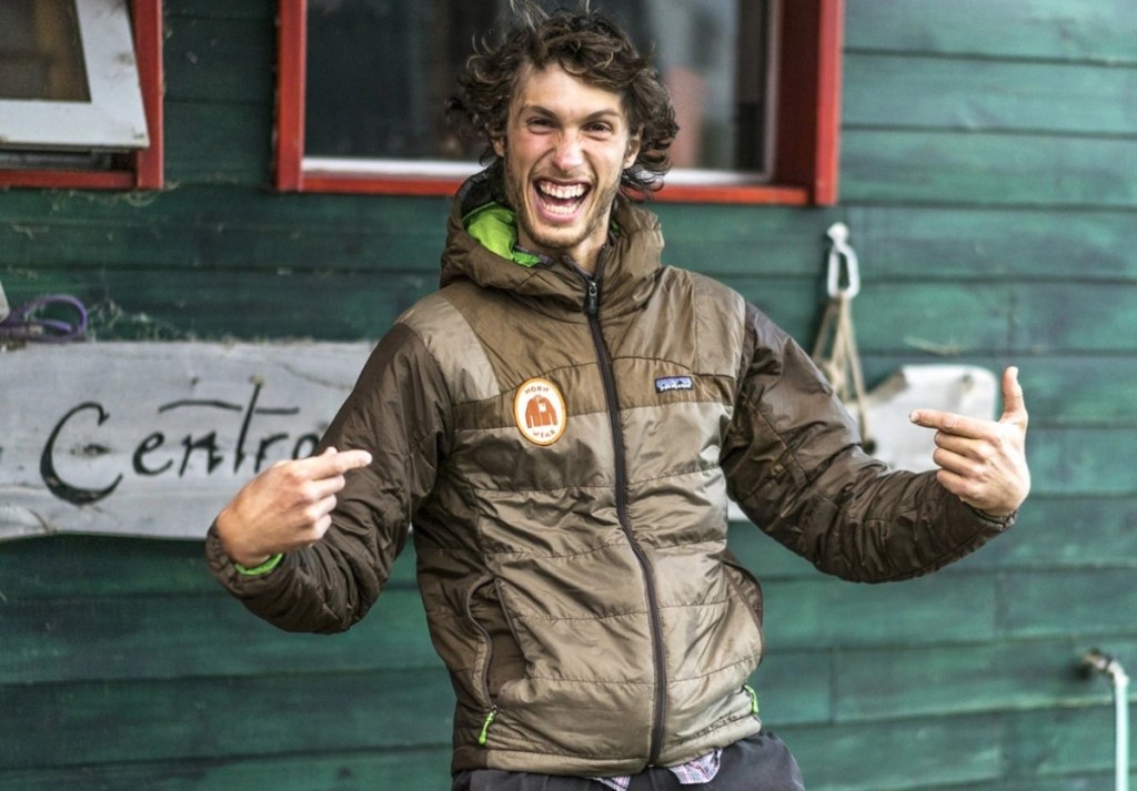 man pointing to brown Patagonia jacket