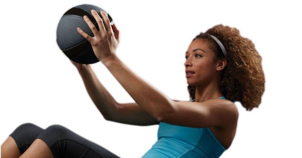 woman using medicine ball