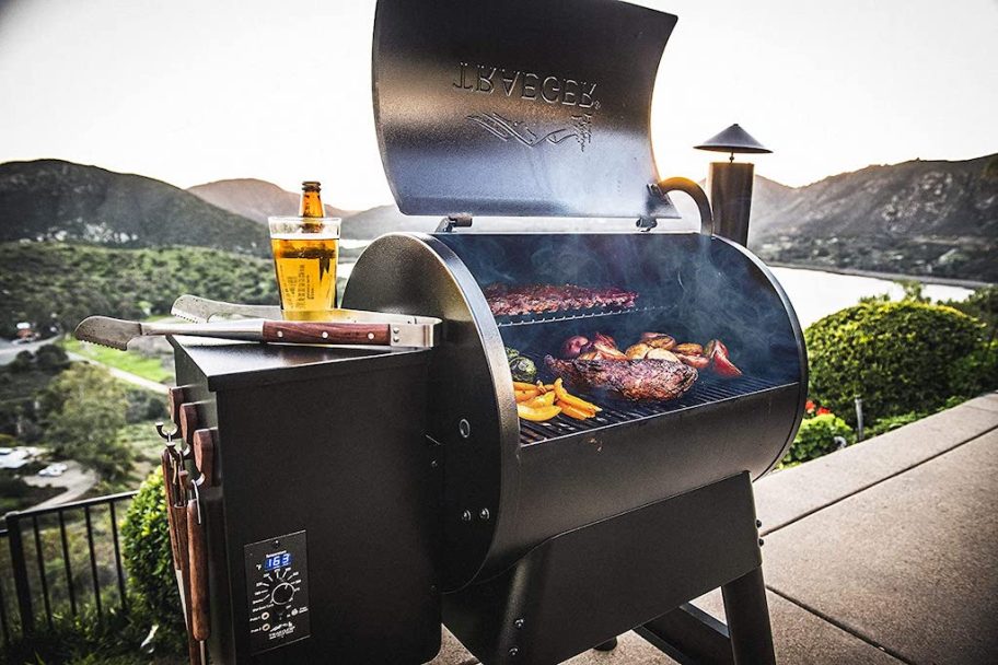 food grilling on an open Traeger grill