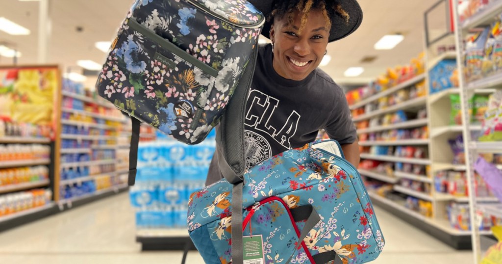 woman holding coolers in target