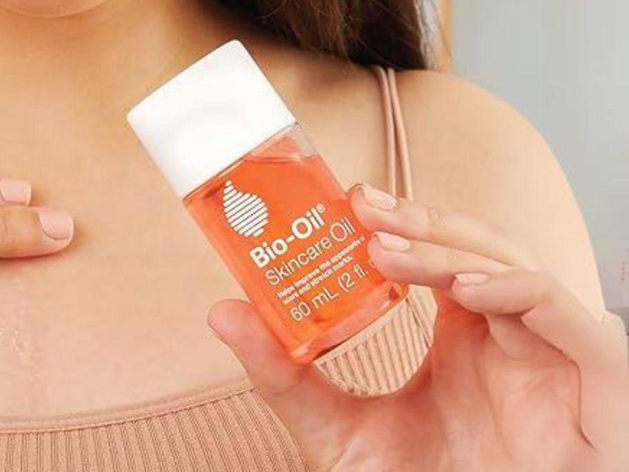 woman holding Bio-Oil Skincare Oil 2oz