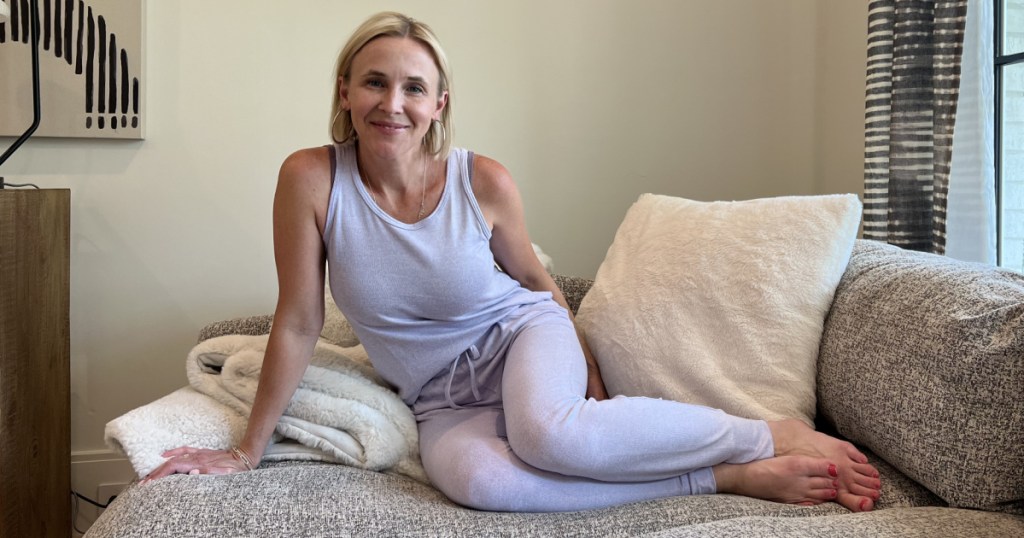 woman sitting on couch in loungewear
