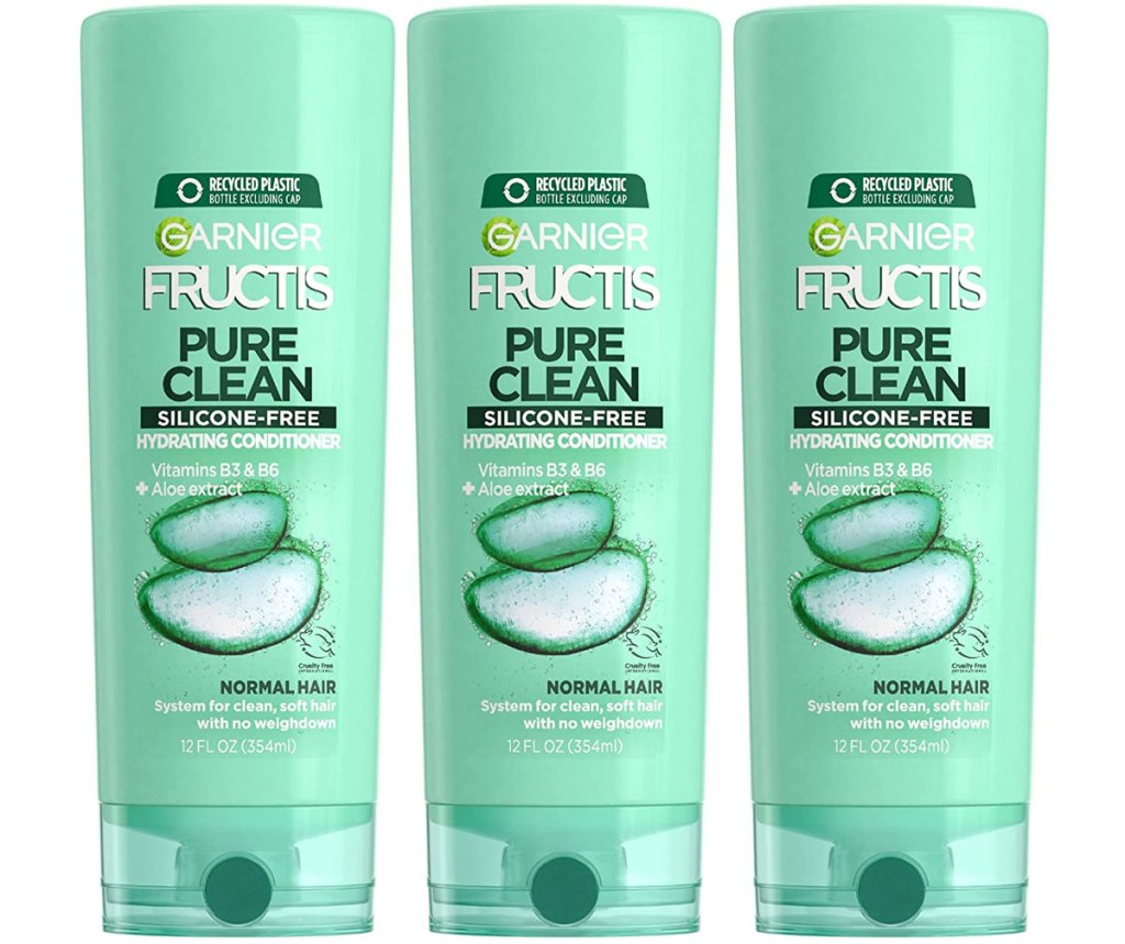 three bottles of garnier conditioner