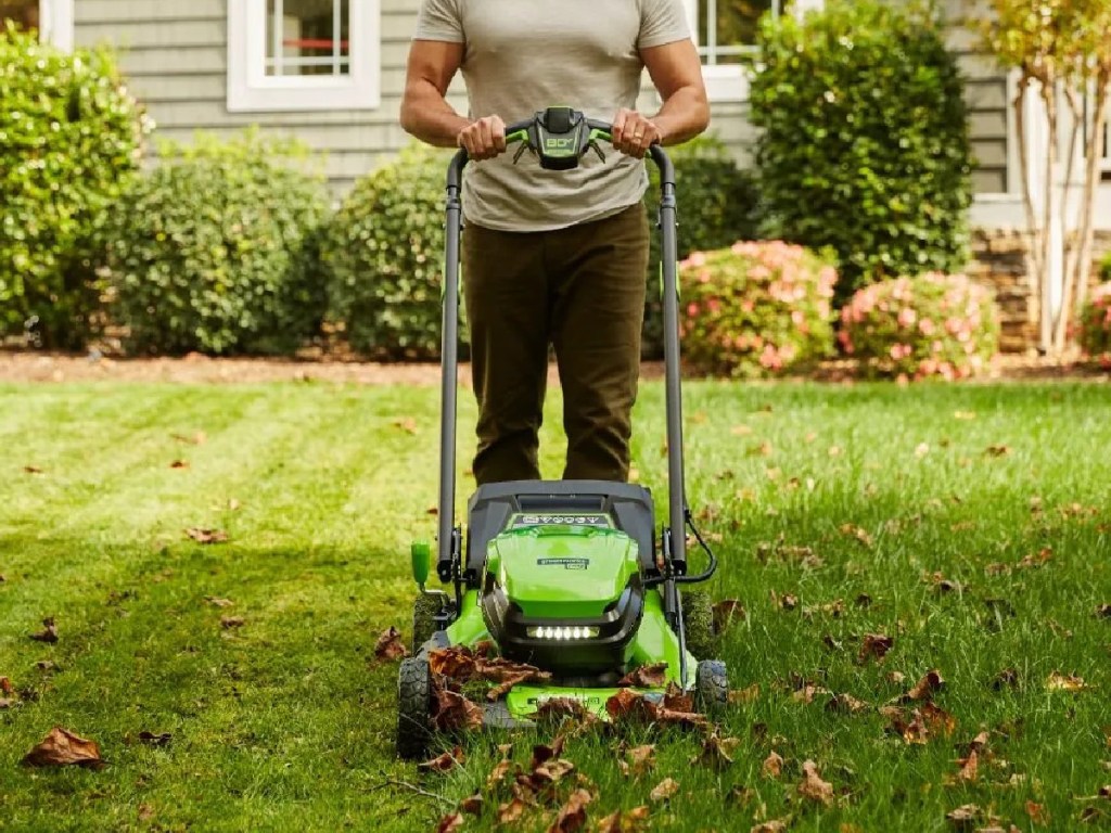 man mowing lawn