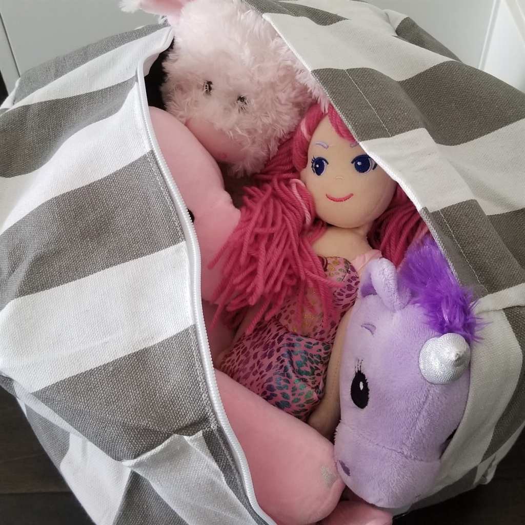 stuffed animals in a storage bag