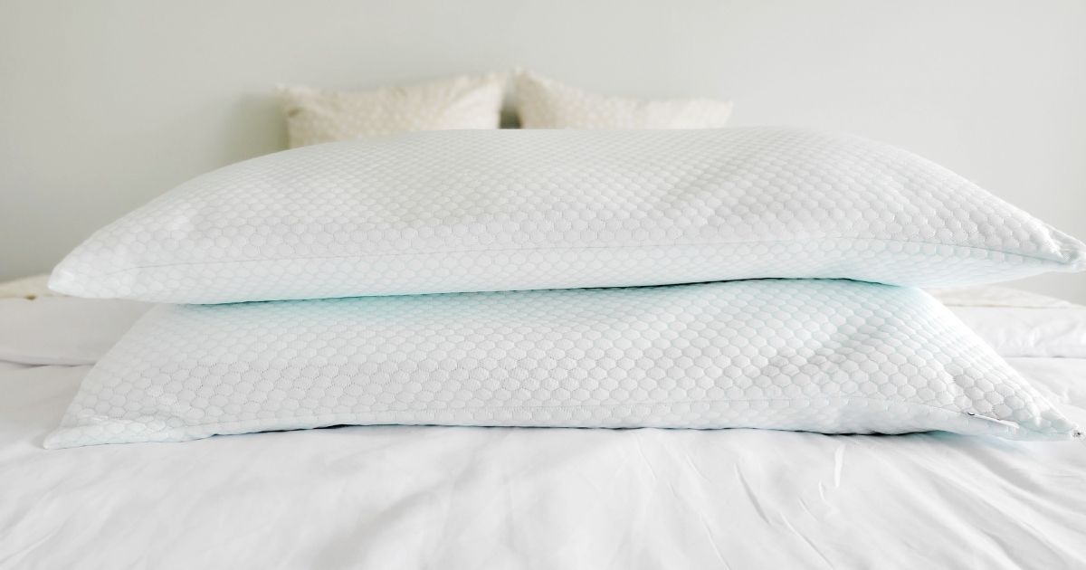 pillows stacked on bed