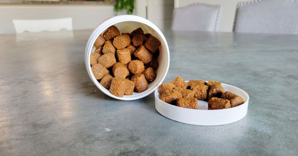 The Anxious Pet product jar opened with some spilling out