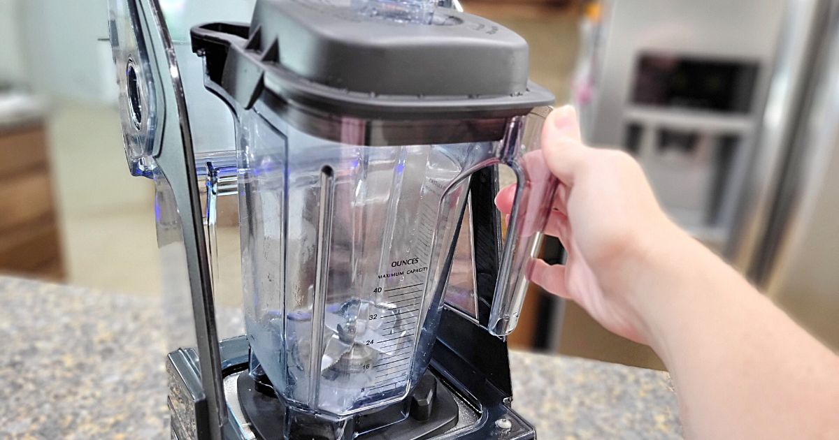 hand holding Vevor blender 