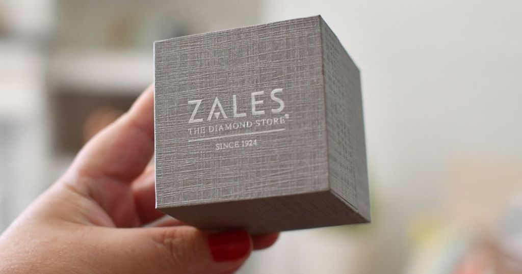 hand holding a Zales Jewelry Box