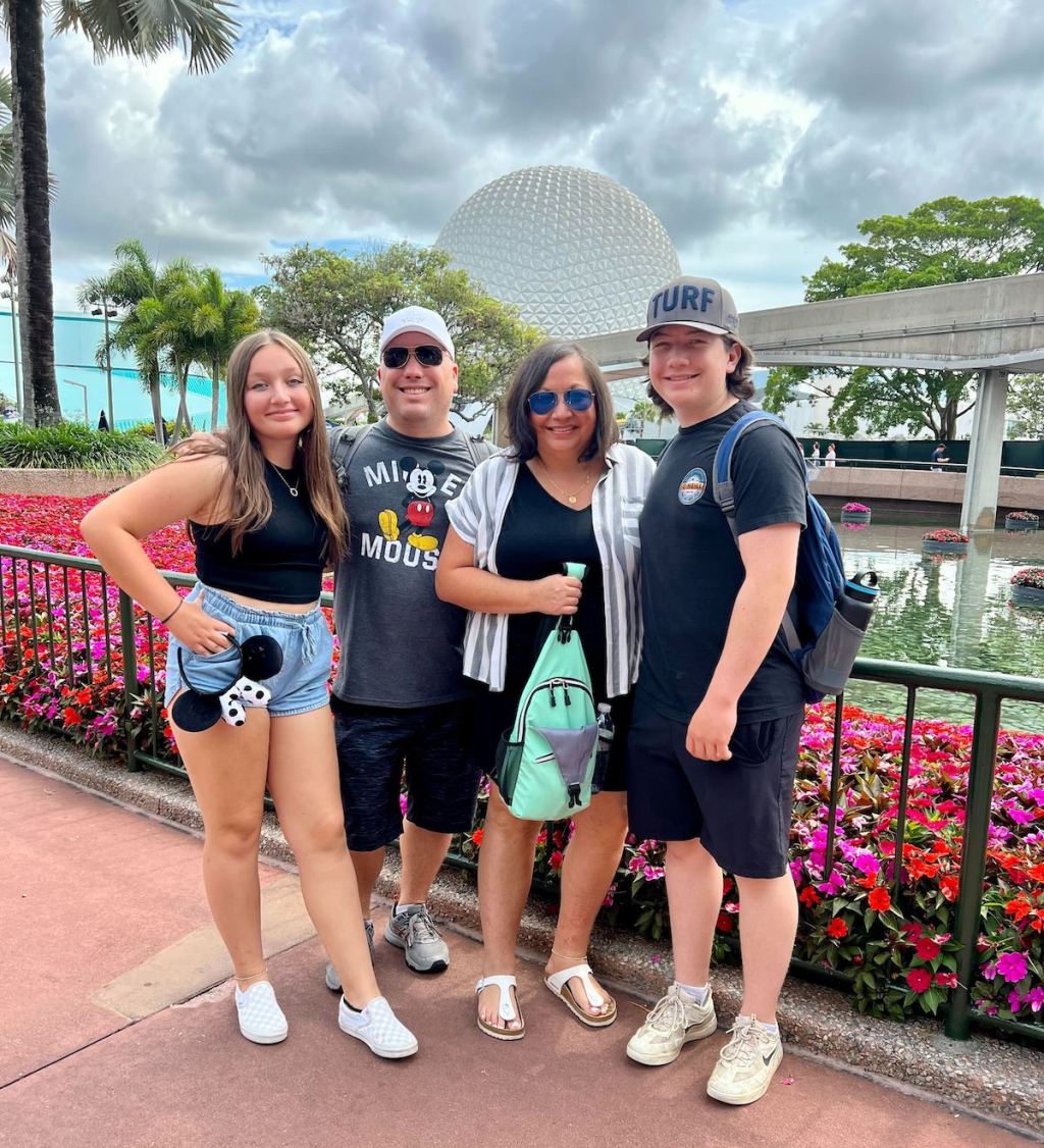 family standing at disney