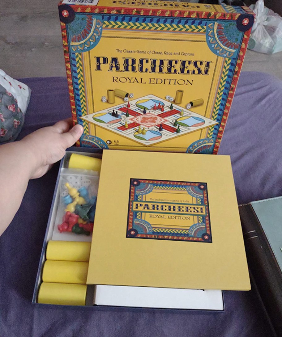 parcheesi board game spread out on couch