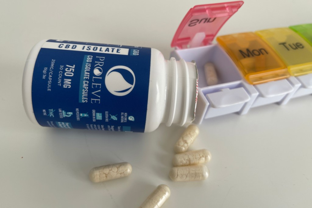 opened bottle of capsules