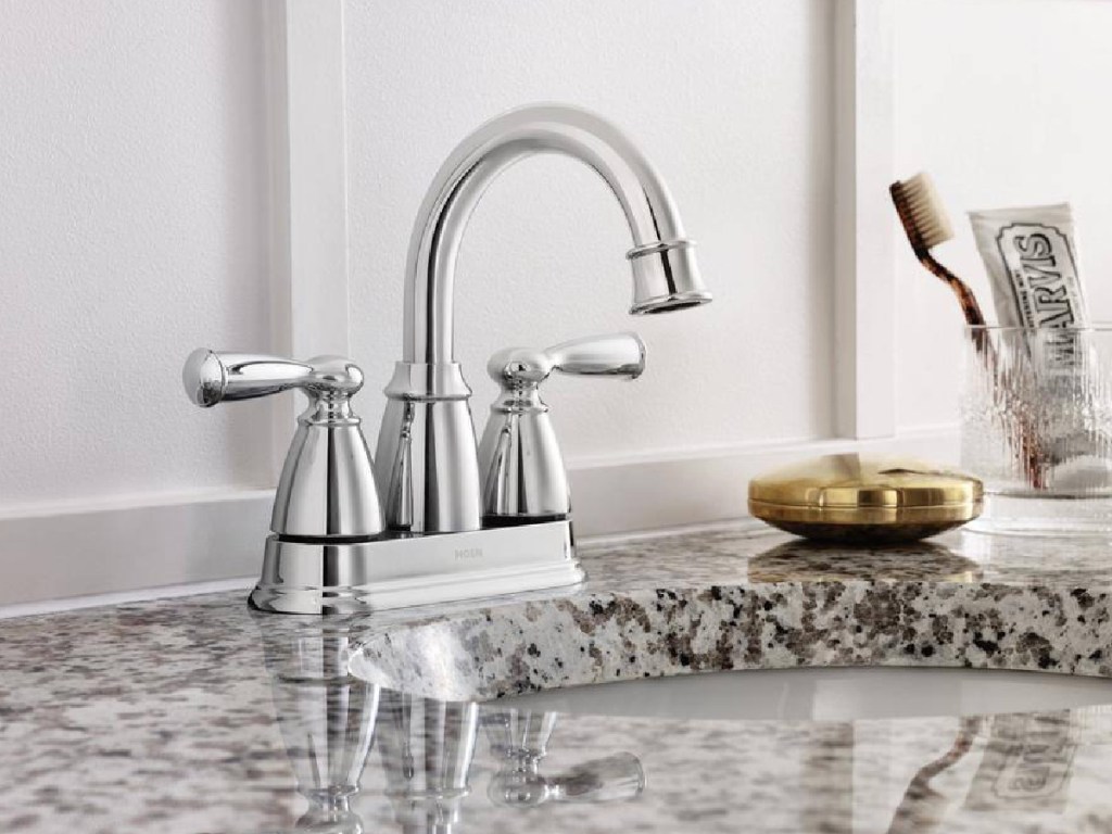 silver faucet displayed on the table